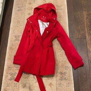 Red, waterproof, jacket with hood.